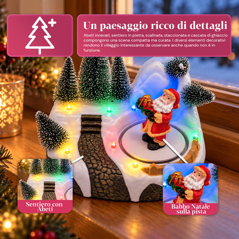 Pueblo navideño luminoso con elemento giratorio, luces LED y música – 3 variantes: árbol, Papá Noel, niños – 17x14x15 cm