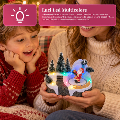 Pueblo navideño luminoso con elemento giratorio, luces LED y música – 3 variantes: árbol, Papá Noel, niños – 17x14x15 cm