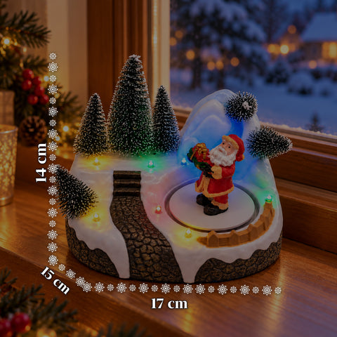 Pueblo navideño luminoso con elemento giratorio, luces LED y música – 3 variantes: árbol, Papá Noel, niños – 17x14x15 cm