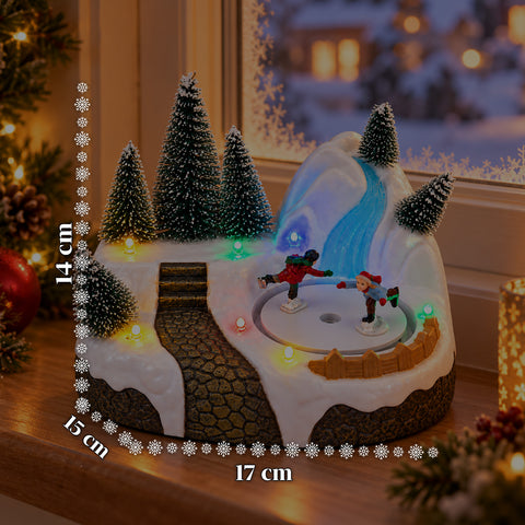 Pueblo navideño luminoso con elemento giratorio, luces LED y música – 3 variantes: árbol, Papá Noel, niños – 17x14x15 cm