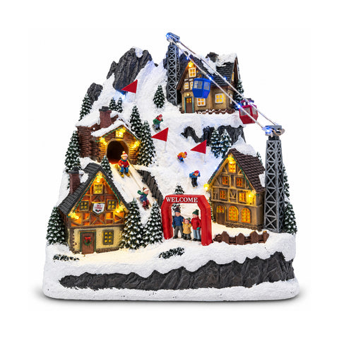 Pueblo navideño luminoso con tobogán en movimiento, teleférico, luces LED y música navideña – 28x19x32 cm