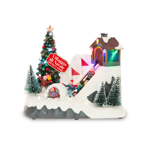 Pueblo navideño animado GlimmerPine con luces LED, música y pista en movimiento